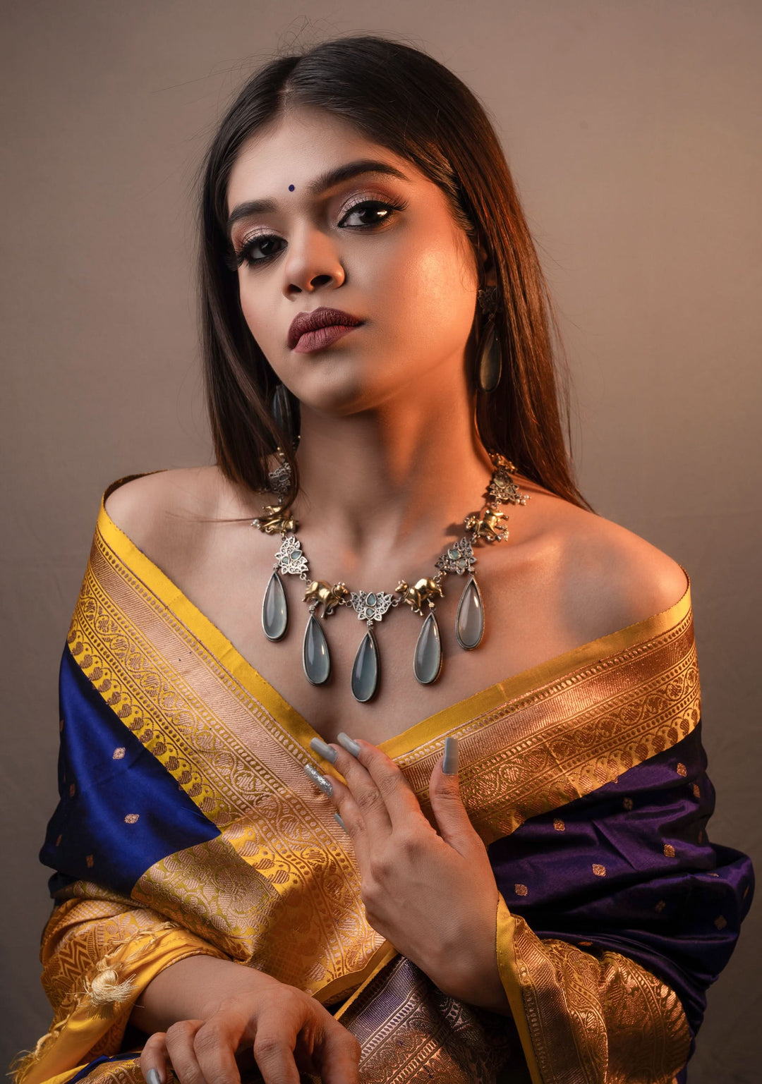 Fusion Dual Tone Jewelry with Pichwai Cow Units and Heather Blue Stones | Shobitam Jewelry