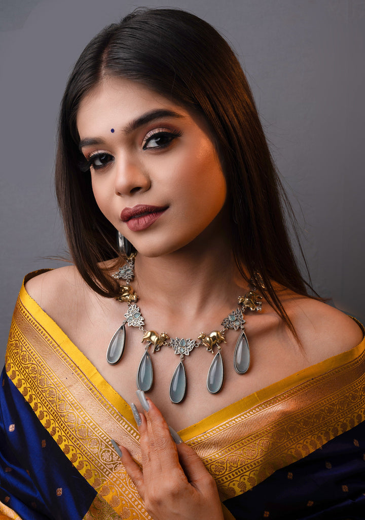 Fusion Dual Tone Jewelry with Pichwai Cow Units and Heather Blue Stones | Shobitam Jewelry