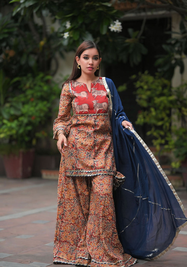 Kadambari - Kalamkari Hand block print 3 piece Sharara Set with Pichwai Hand Block Print Yoke in Brick and Navy | Made To Order