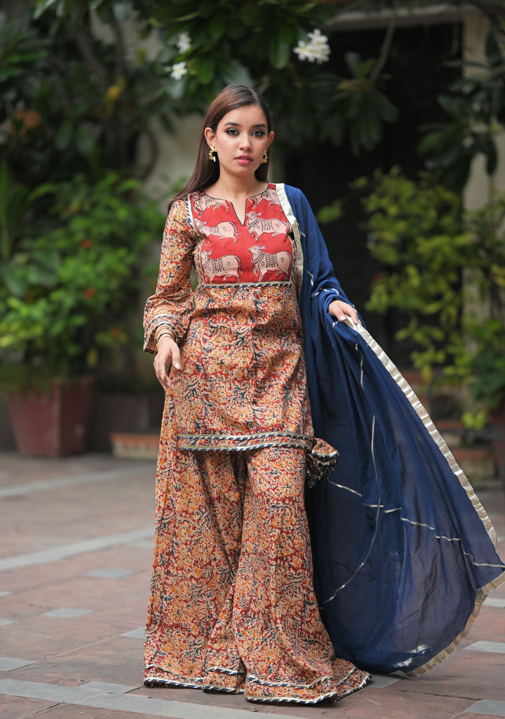 Kadambari - Kalamkari Hand block print 3 piece Sharara Set with Pichwai Hand Block Print Yoke in Brick and Navy | Made To Order