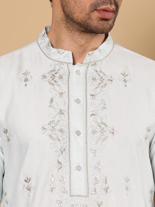 Men's Light Blue Straight Viscose Silk Kurta with Embroidered Neckline and Motifs,Cream solid trouser style churidar   | SHOBITAM