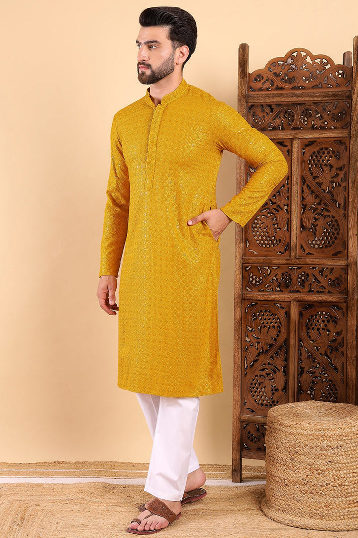 Yellow Viscose Rayon Solid Embroidered Straight Kurta | SHOBITAM