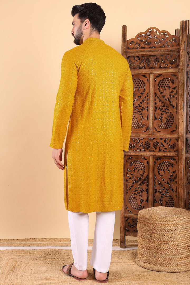 Yellow Viscose Rayon Solid Embroidered Straight Kurta | SHOBITAM