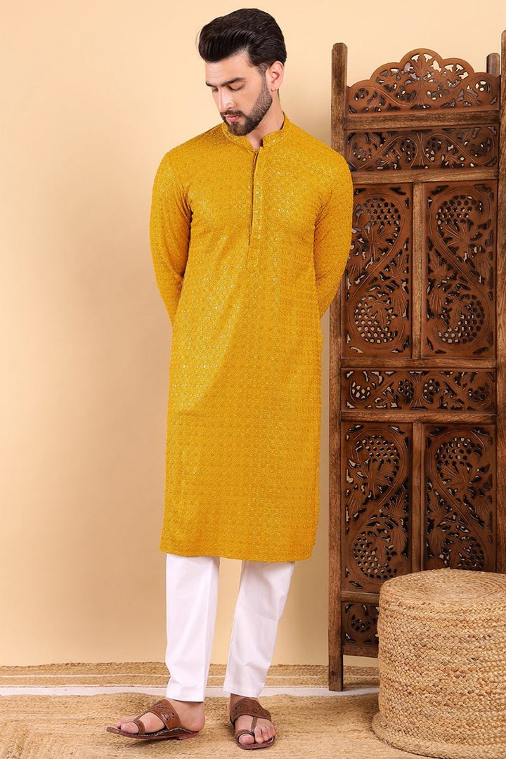 Yellow Viscose Rayon Solid Embroidered Straight Kurta | SHOBITAM