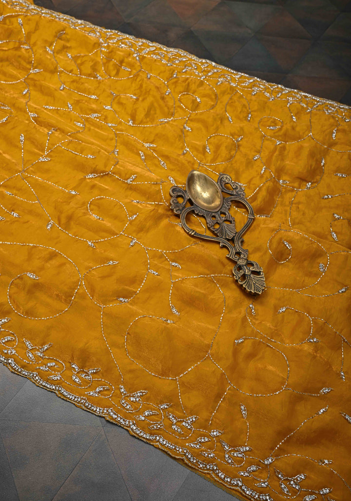 Mustard Yellow satin georgette saree with Jaal Cutdana, Stone Work