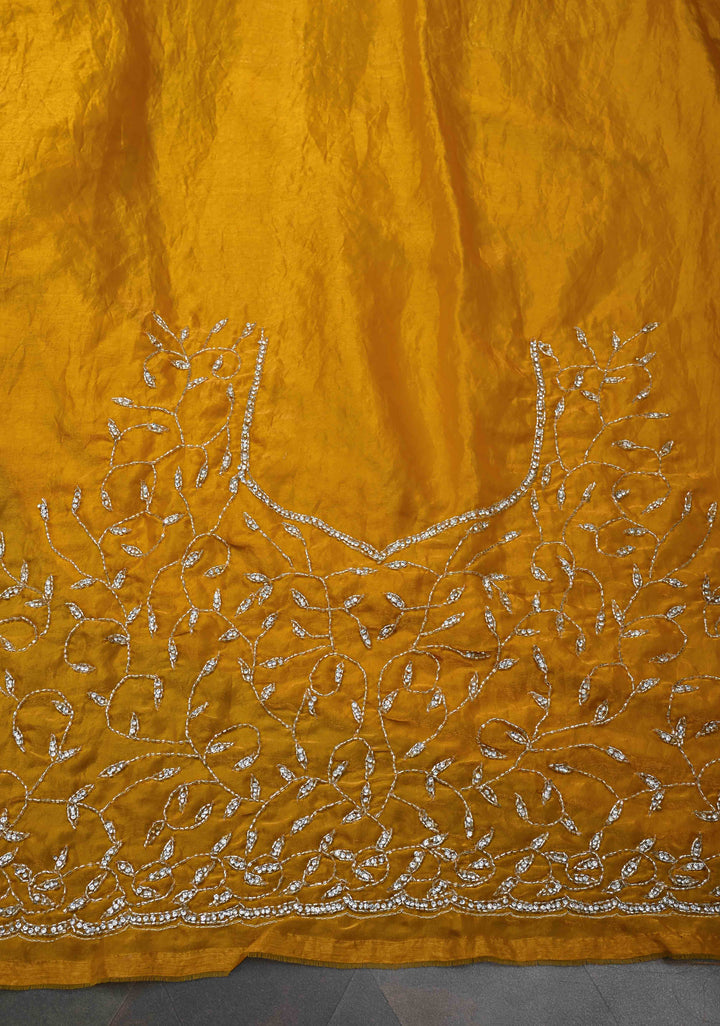 Mustard Yellow satin georgette saree with Jaal Cutdana, Stone Work