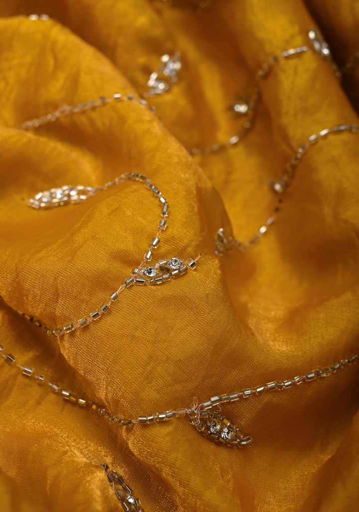 Mustard Yellow satin georgette saree with Jaal Cutdana, Stone Work