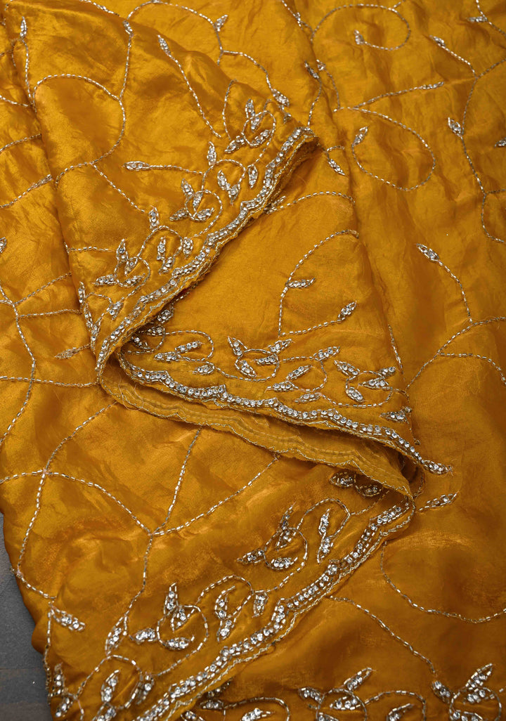 Mustard Yellow satin georgette saree with Jaal Cutdana, Stone Work