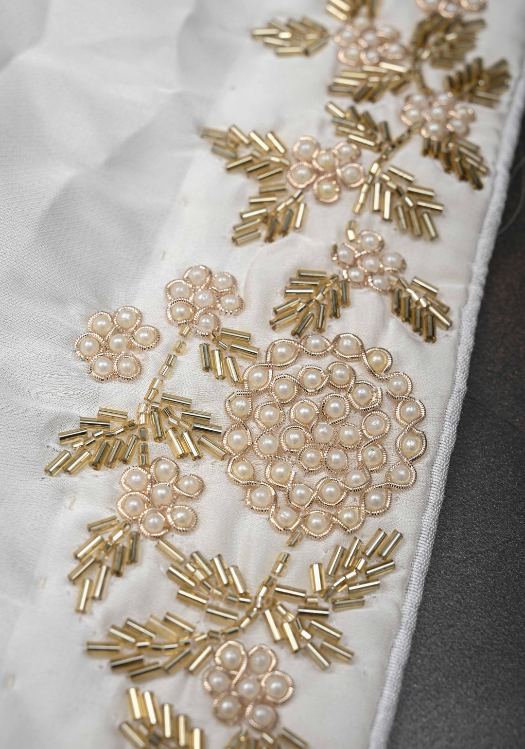 Ivory satin georgette Saree with sequins and Moti work Buttas and Boder