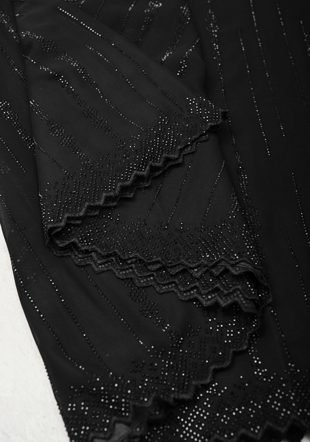 Black Tone on Tone Powder Stones Work on Georgette Saree with Floral Stripes and Scallop Border