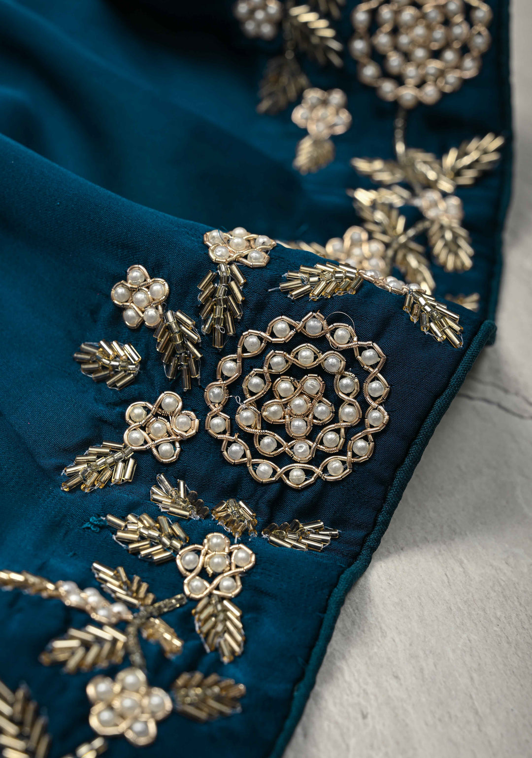 Prussian Blue Satin Georgette Saree with cutdana, moti and Zardosi Embellished
