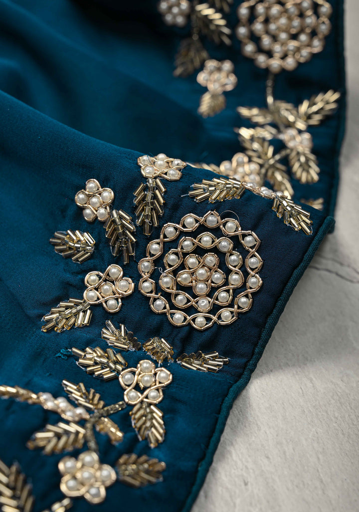 Prussian Blue Satin Georgette Saree with cutdana, moti and Zardosi Embellished