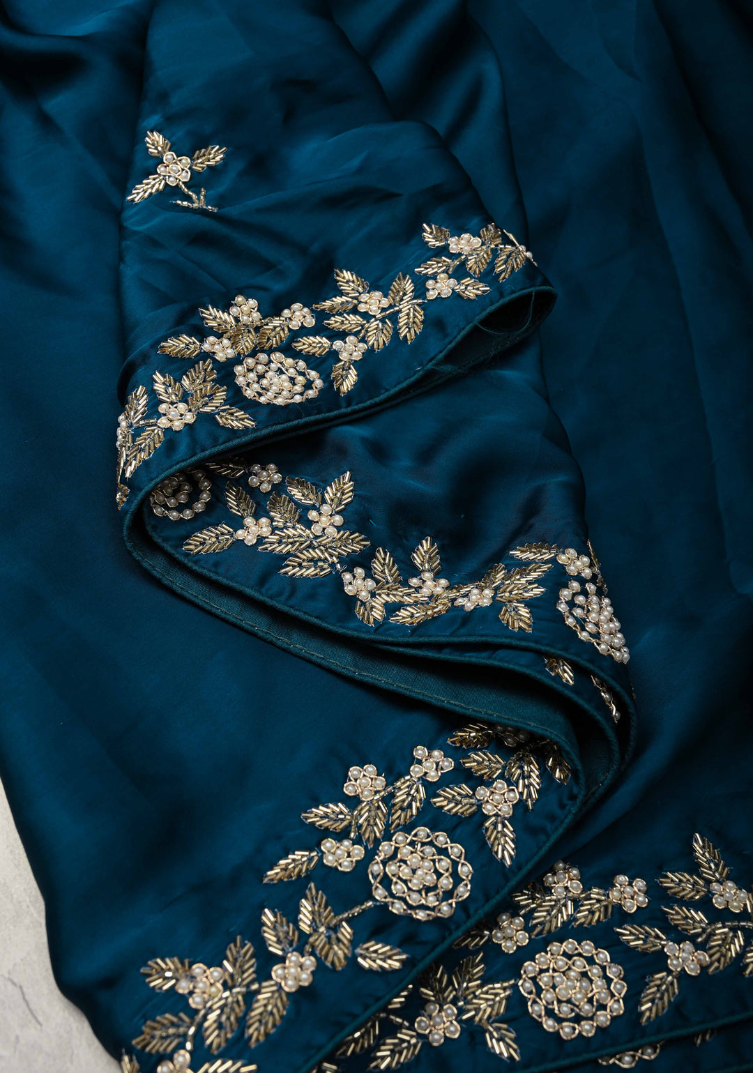 Prussian Blue Satin Georgette Saree with cutdana, moti and Zardosi Embellished