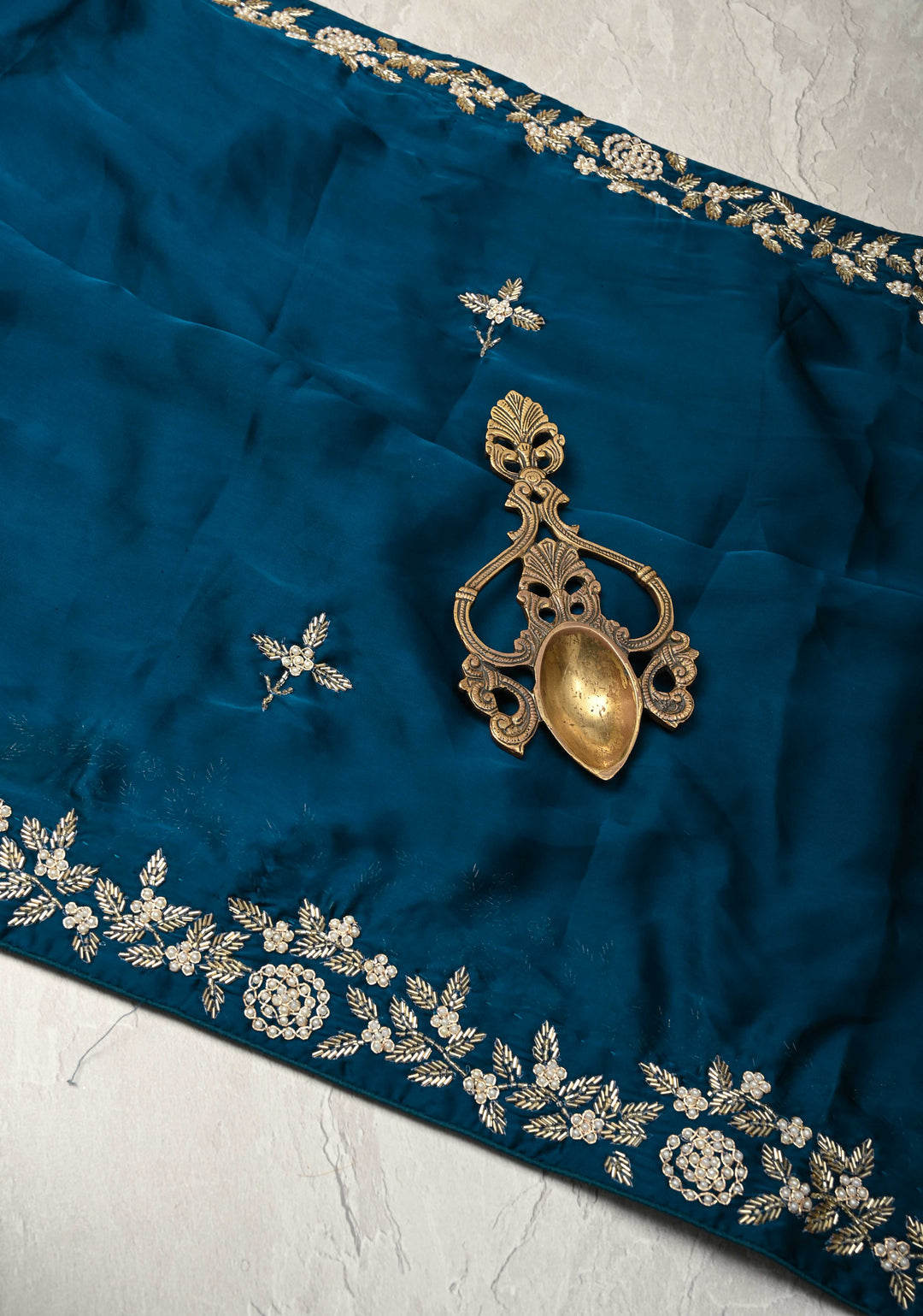 Prussian Blue Satin Georgette Saree with cutdana, moti and Zardosi Embellished