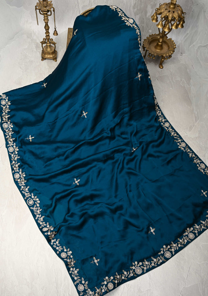 Prussian Blue Satin Georgette Saree with cutdana, moti and Zardosi Embellished