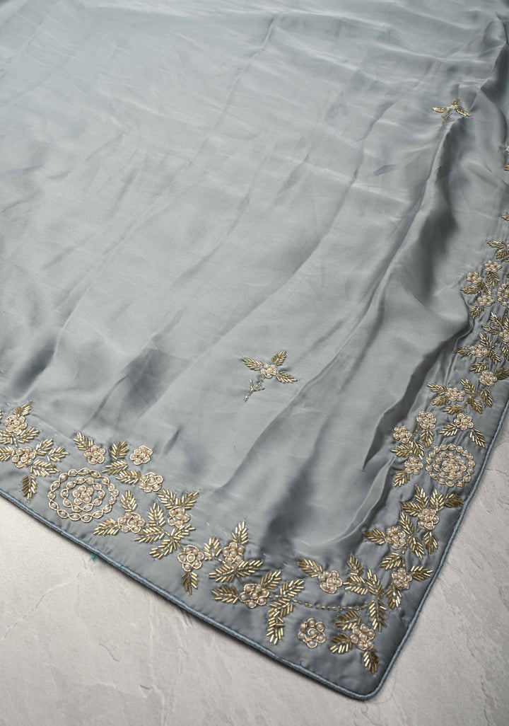 Grey Satin Georgette saree with moti, cutdana and Zardosi embellishments