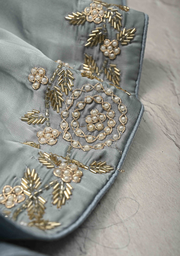 Grey Satin Georgette saree with moti, cutdana and Zardosi embellishments