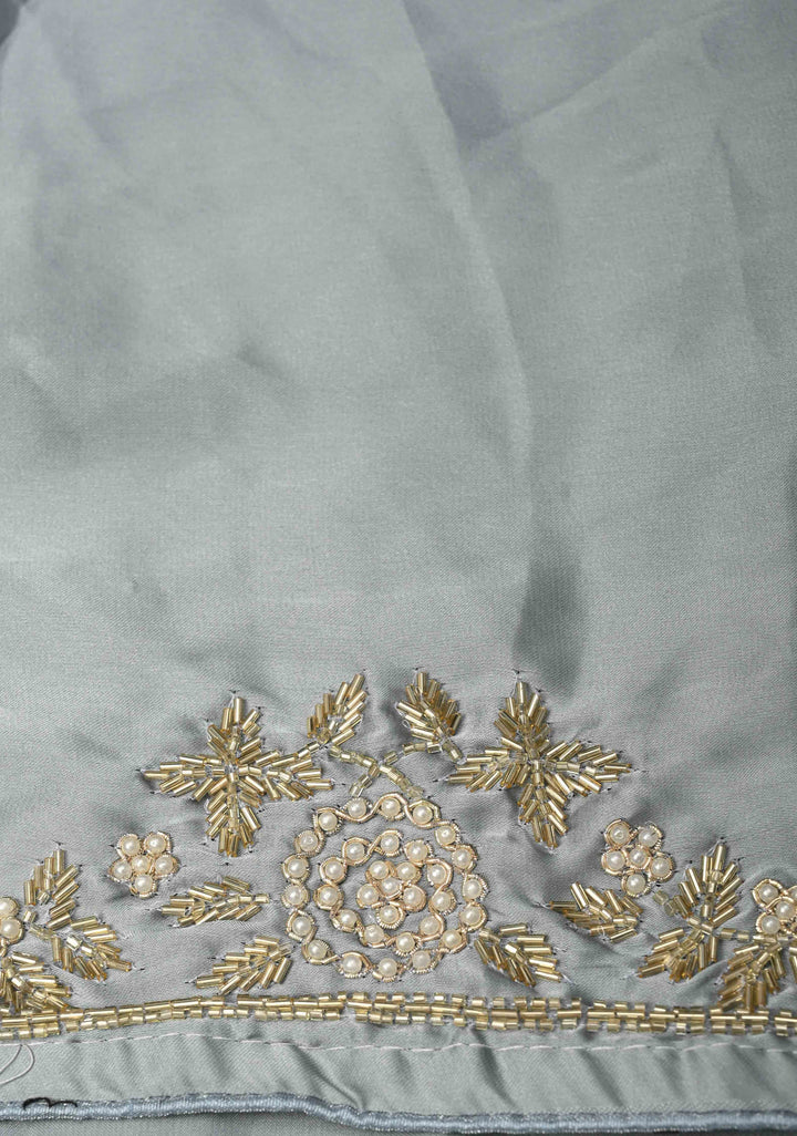 Grey Satin Georgette saree with moti, cutdana and Zardosi embellishments