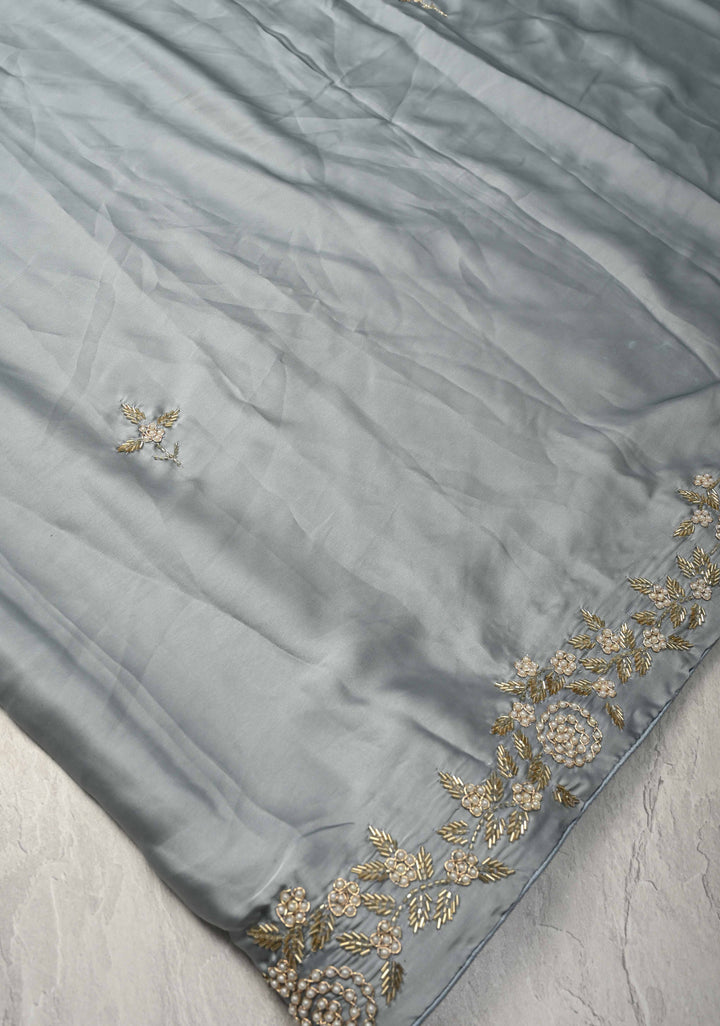 Grey Satin Georgette saree with moti, cutdana and Zardosi embellishments