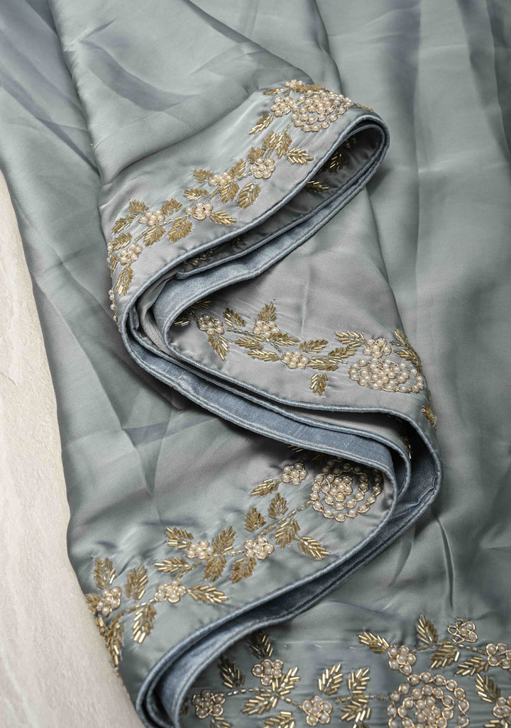 Grey Satin Georgette saree with moti, cutdana and Zardosi embellishments
