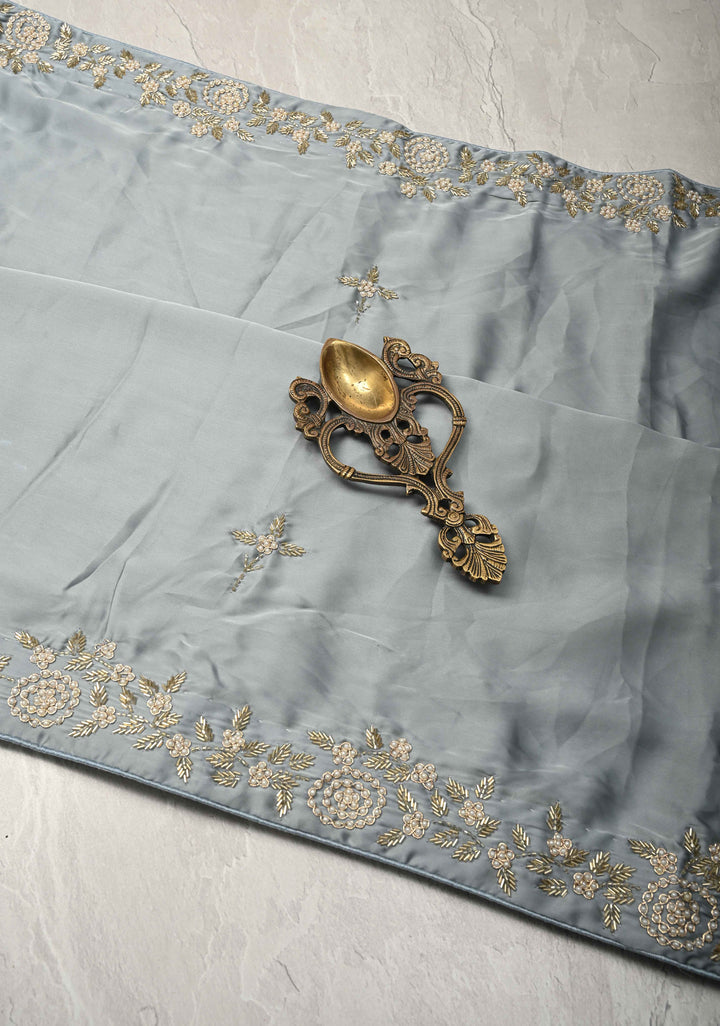 Grey Satin Georgette saree with moti, cutdana and Zardosi embellishments
