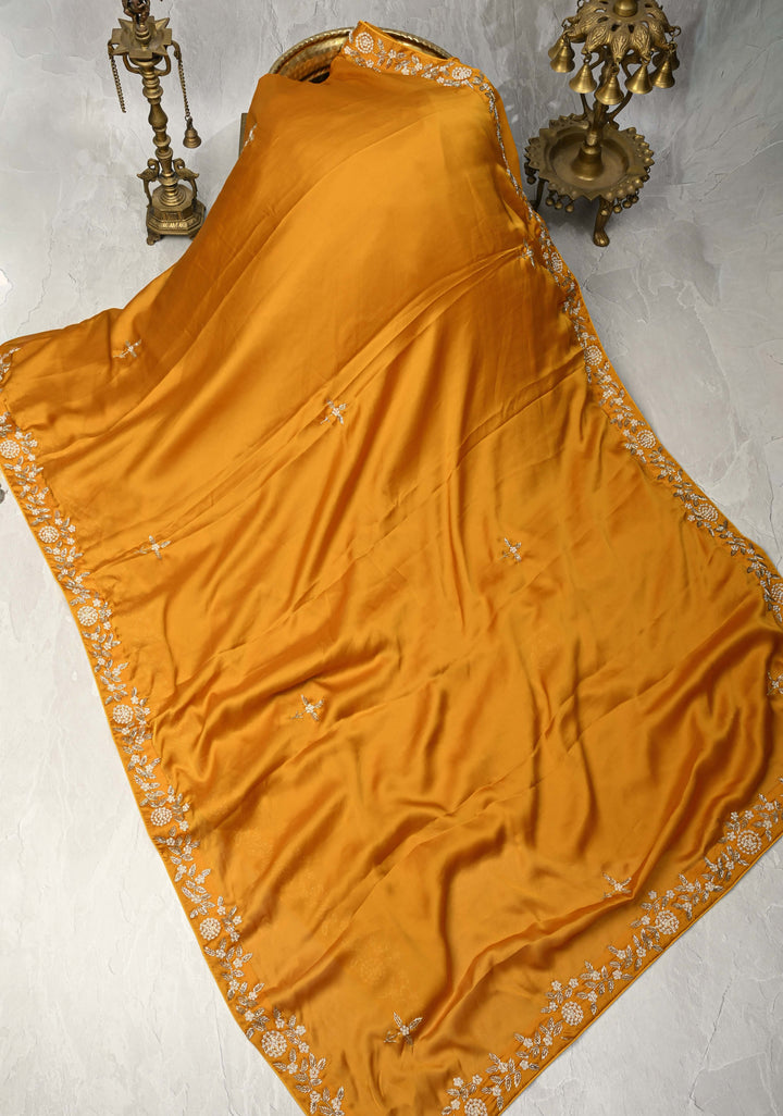 Mustard Yellow  Satin Georgette saree with moti, cutdana and Zardozi embellishments