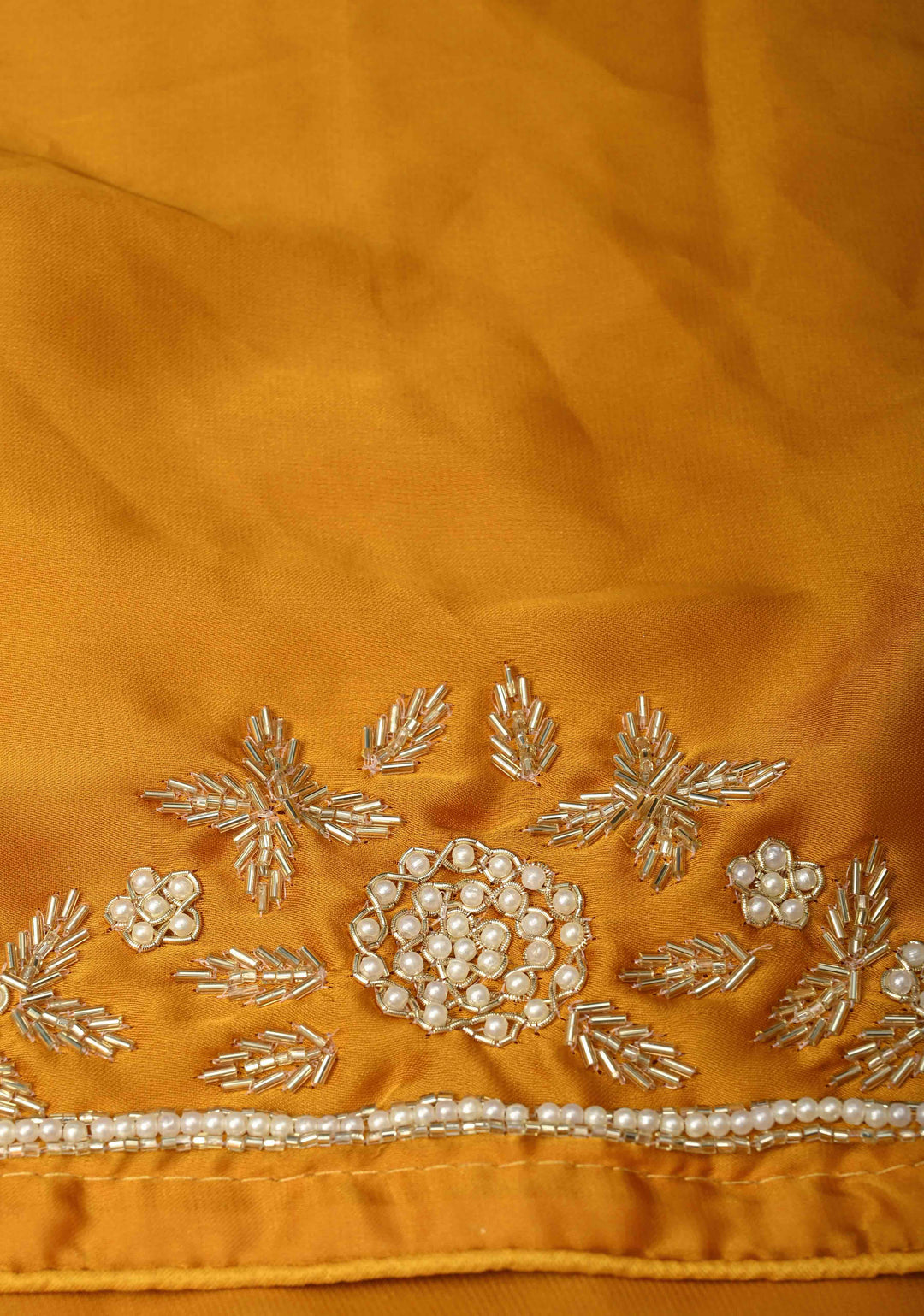 Mustard Yellow  Satin Georgette saree with moti, cutdana and Zardozi embellishments
