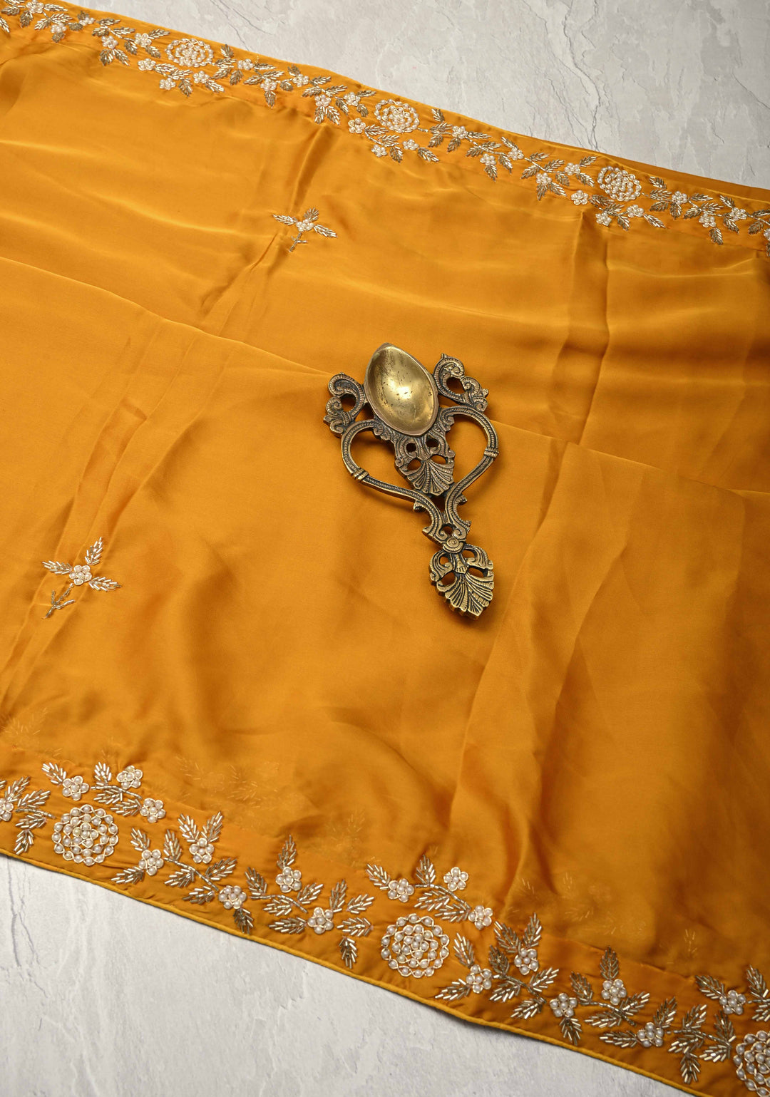 Mustard Yellow  Satin Georgette saree with moti, cutdana and Zardozi embellishments