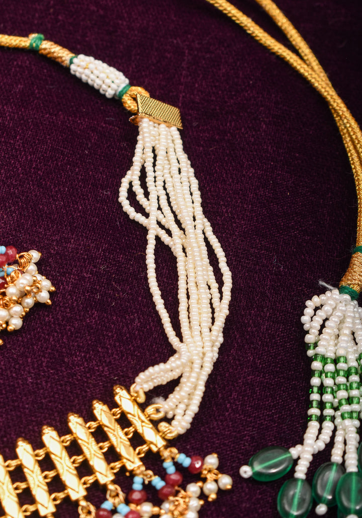 Microplated Gold Tone Flexible Design Necklace Set with  Floral Jadau center and dangling beads | Shobitam Jewelry