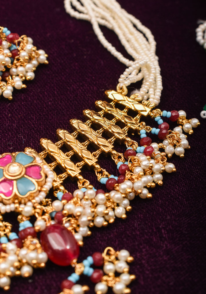 Microplated Gold Tone Flexible Design Necklace Set with  Floral Jadau center and dangling beads | Shobitam Jewelry