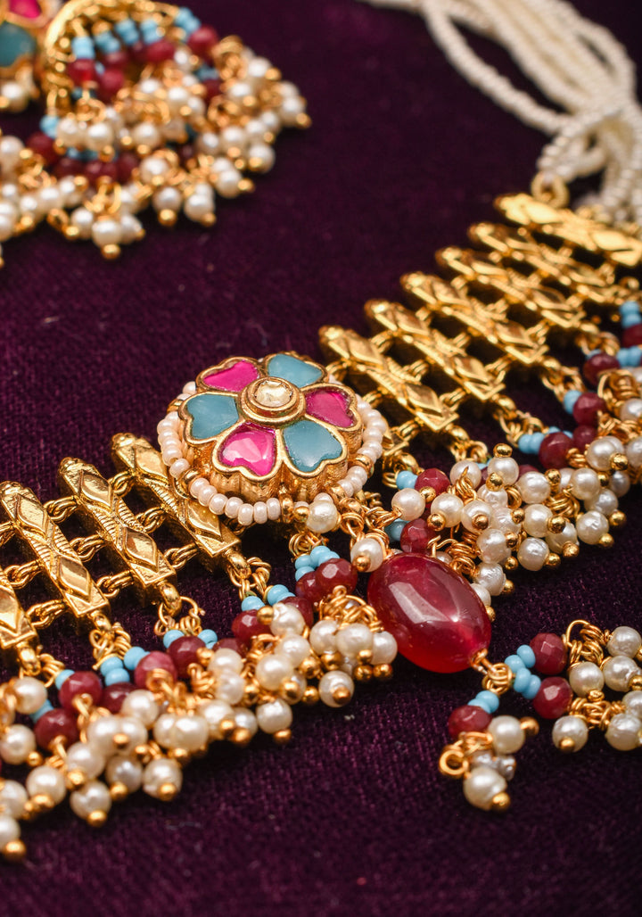 Microplated Gold Tone Flexible Design Necklace Set with  Floral Jadau center and dangling beads | Shobitam Jewelry