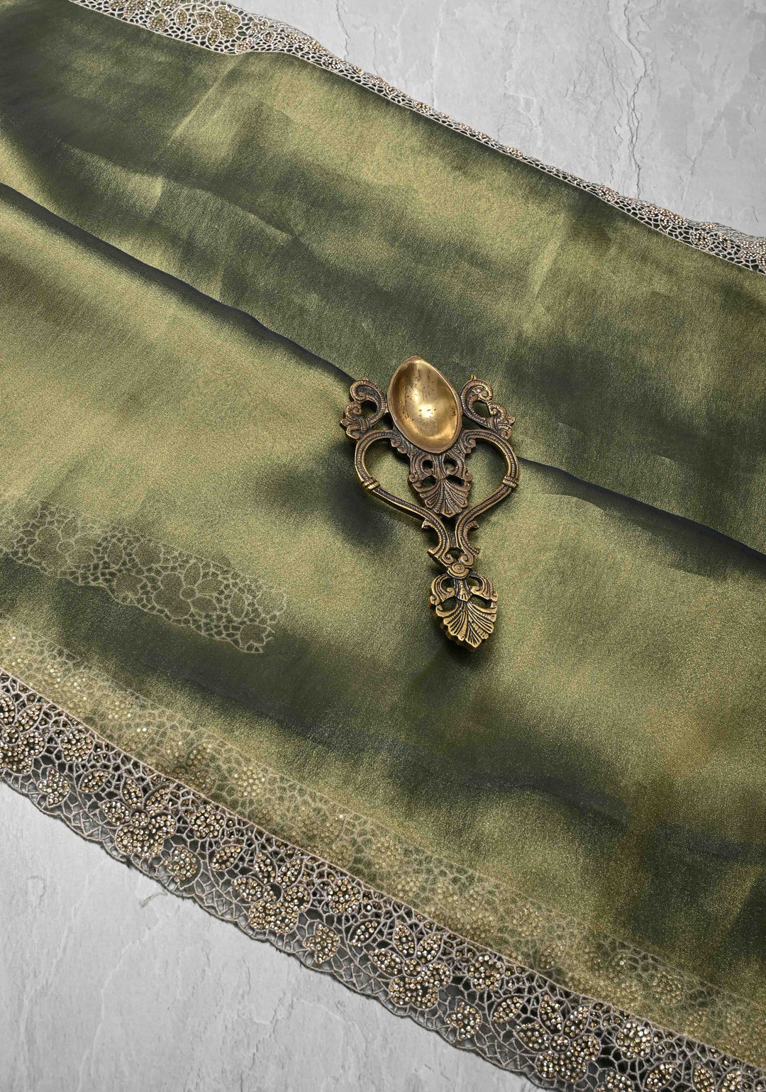 Sage Green Dual tone Shimmer Organza Saree with Machine Cut Work And Stone on Scallop Border