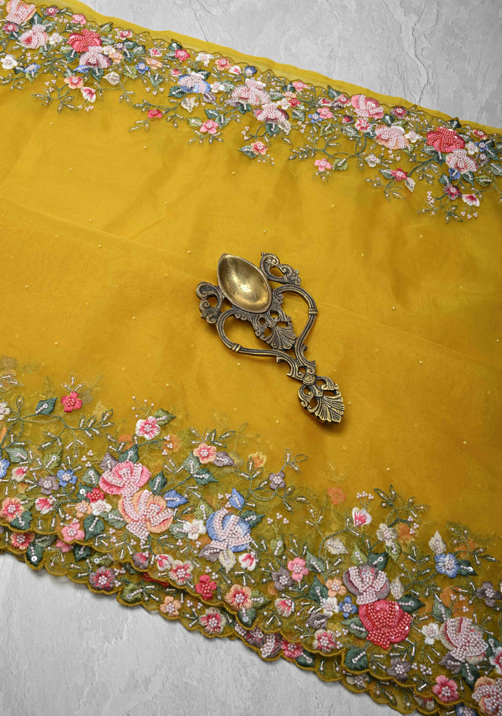 Mustard Yellow Moti work on Organza Saree with sequins, cutdana and Resham Hand Embroidery on Scallop Border