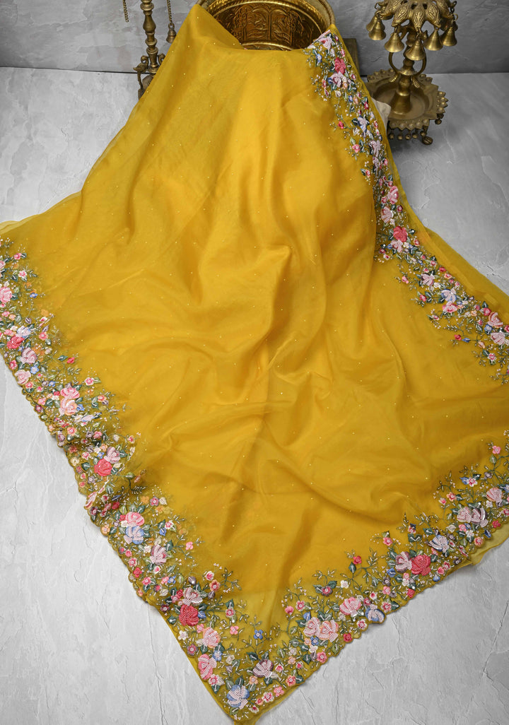 Mustard Yellow Moti work on Organza Saree with sequins, cutdana and Resham Hand Embroidery on Scallop Border