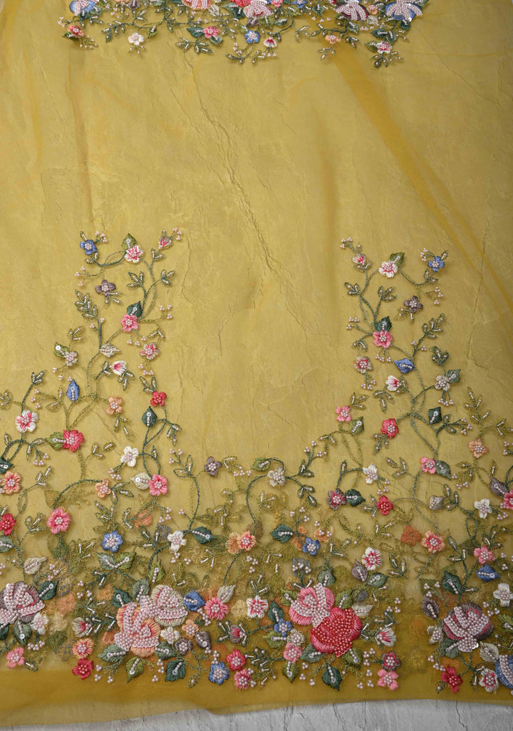 Mustard Yellow Moti work on Organza Saree with sequins, cutdana and Resham Hand Embroidery on Scallop Border
