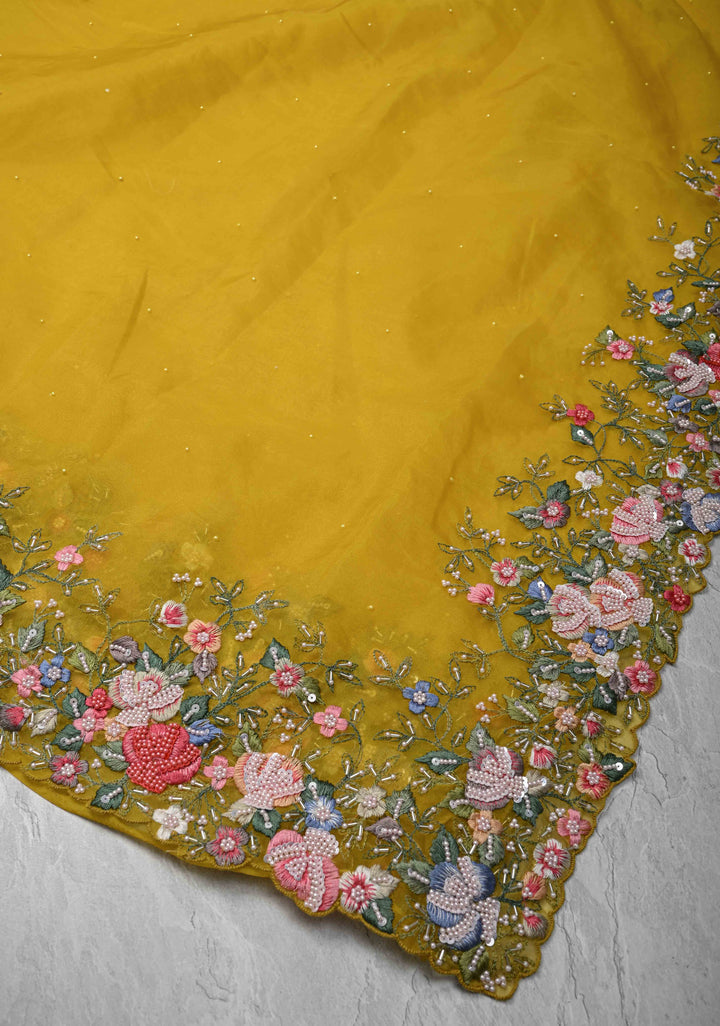 Mustard Yellow Moti work on Organza Saree with sequins, cutdana and Resham Hand Embroidery on Scallop Border