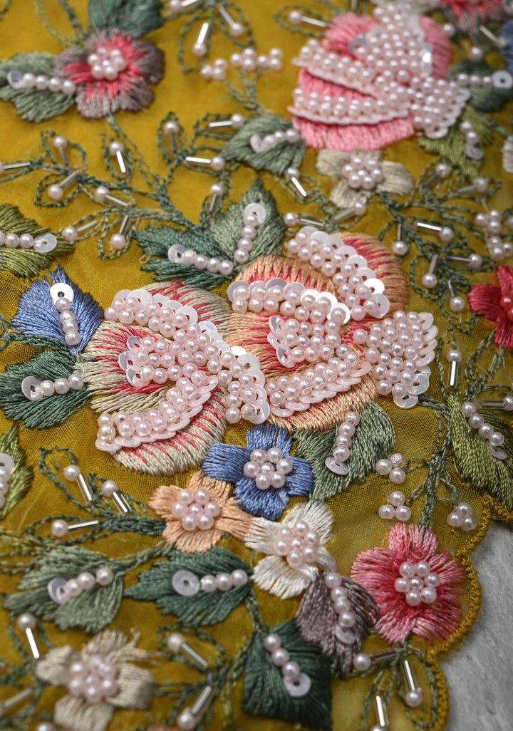 Mustard Yellow Moti work on Organza Saree with sequins, cutdana and Resham Hand Embroidery on Scallop Border