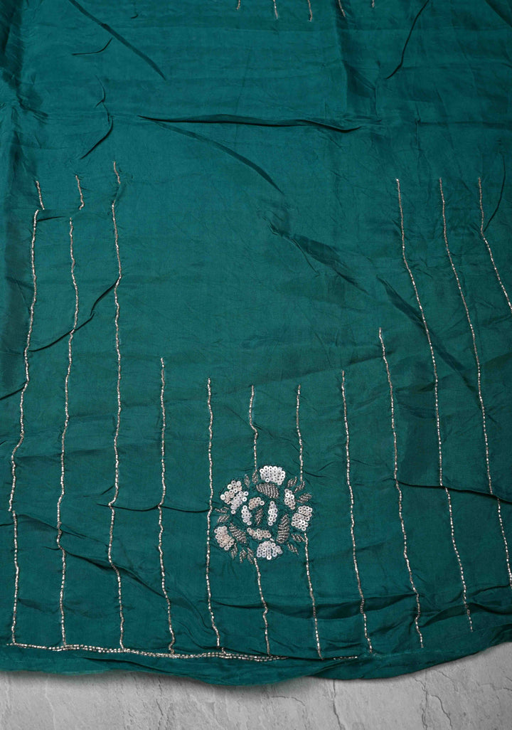 Peacock Green Organza Saree with sequins, cutdana, Moti Machine Embroidery and Scallop Border