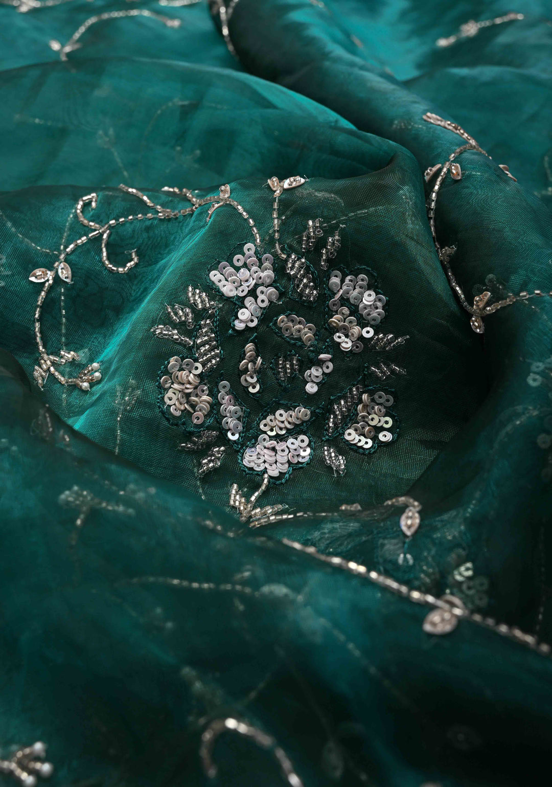 Peacock Green Organza Saree with sequins, cutdana, Moti Machine Embroidery and Scallop Border