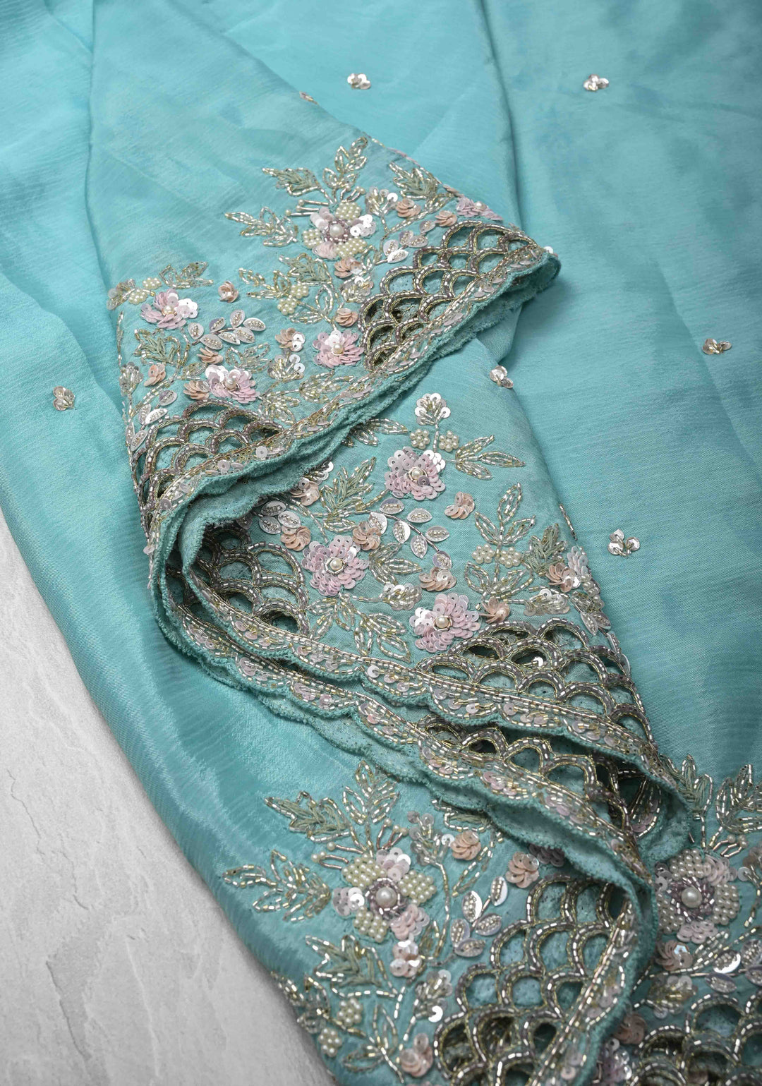 Sky Blue Floral Jaal on Crushed Georgette Saree with Sequins, Cutwork border, Moti Embellishment and Scallop Border
