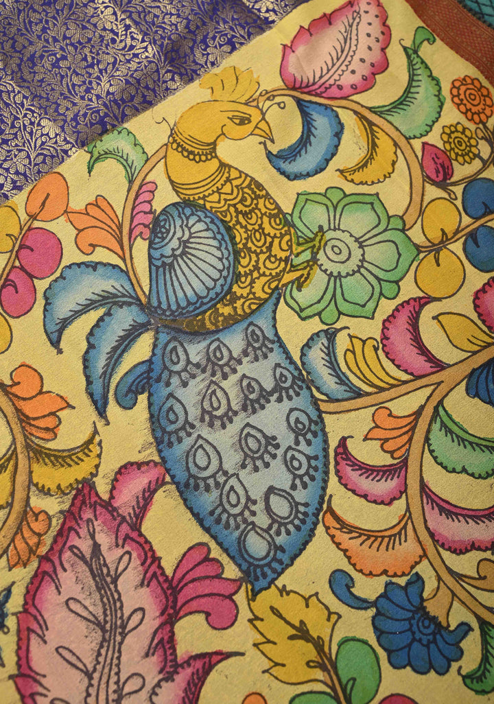Yellow and Purple Handpainted Pen Kalamkari on Pure Mysore Silk Saree with Zari Brocade Jaal and Rettaipet Border | SILK MARK CERTIFIED