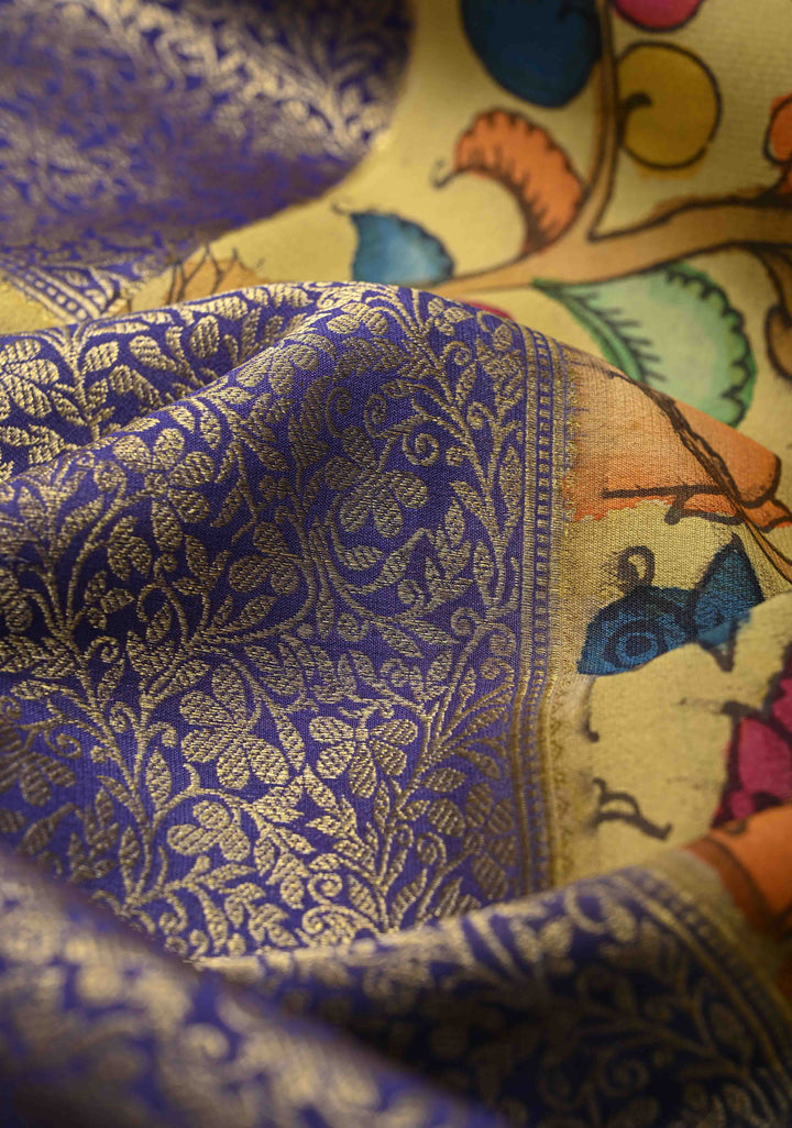 Yellow and Purple Handpainted Pen Kalamkari on Pure Mysore Silk Saree with Zari Brocade Jaal and Rettaipet Border | SILK MARK CERTIFIED