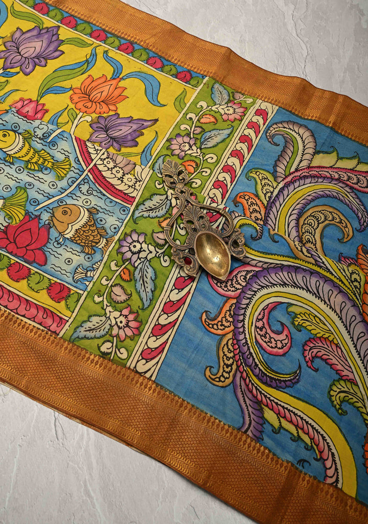 Mathsya Pond and Lotus Theme :  Laconia Yellow Authentic Pen Kalamkari on Pure Mangalagiri Silk Cotton Saree with Zari Borders