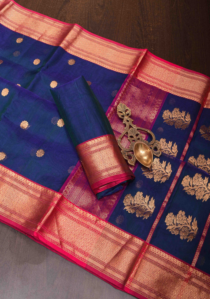 Exquisite Chanderi Silk Saree in Peacock Blue Dual tone with Zari Buttas and Zari Borders