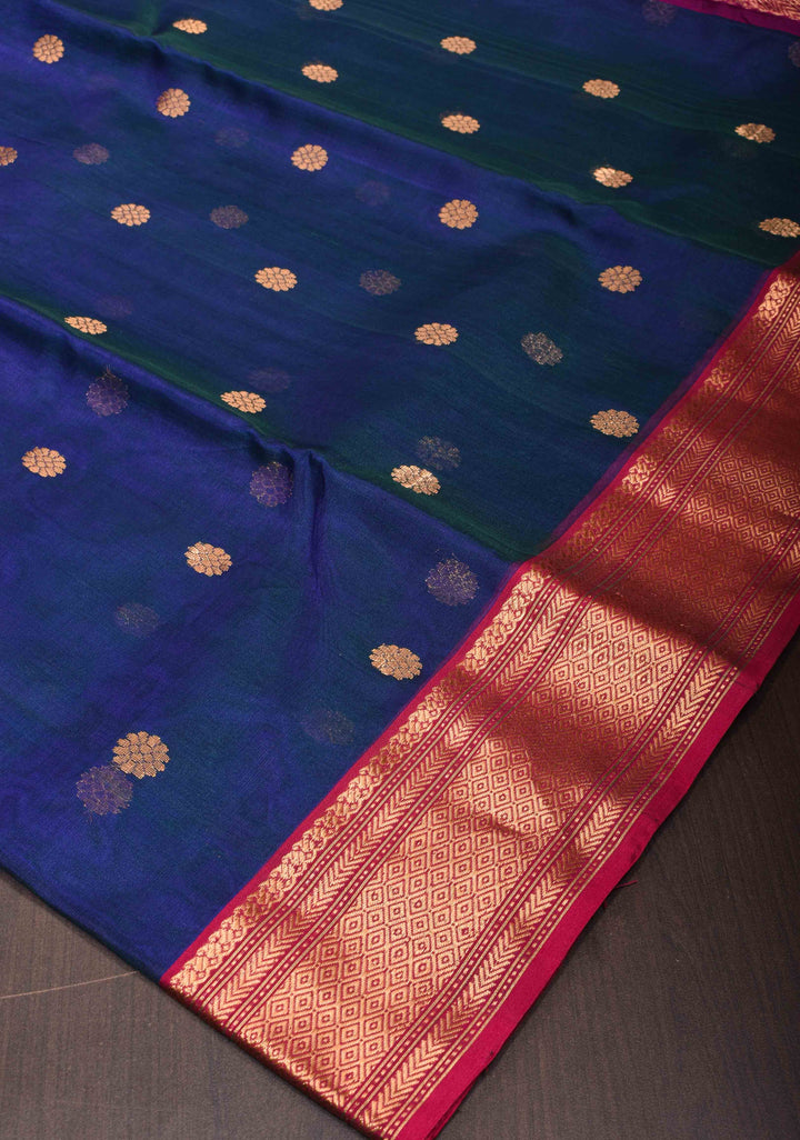 Exquisite Chanderi Silk Saree in Peacock Blue Dual tone with Zari Buttas and Zari Borders