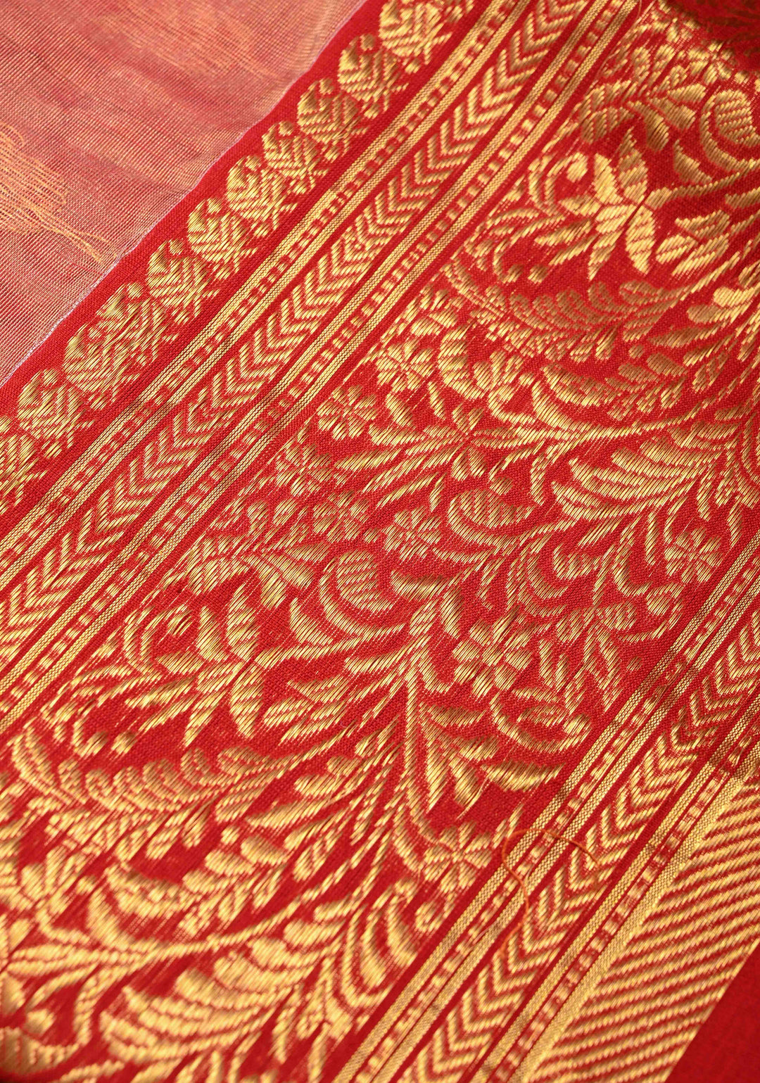 Vermillion Tissue Chanderi Silk Saree with Floral Buttas and Zari Borders