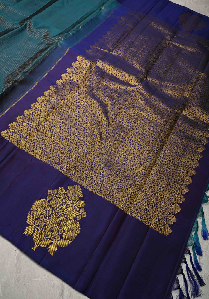 Dark Teal Pure Kanjivaram Silk Handloom Saree with Vairaoosi Zari Stripes and Distinct Floral Motofs on Contrast Border  | SILK MARK CERTIFIED
