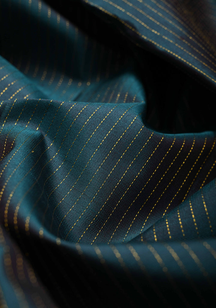 Dark Teal Pure Kanjivaram Silk Handloom Saree with Vairaoosi Zari Stripes and Distinct Floral Motofs on Contrast Border  | SILK MARK CERTIFIED