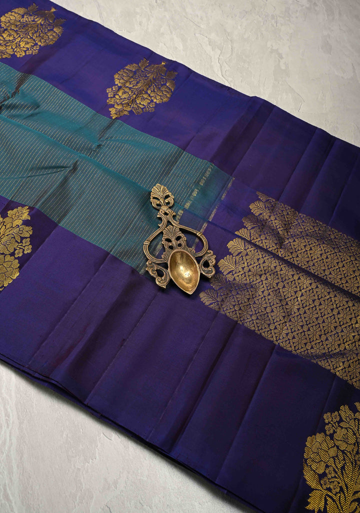 Dark Teal Pure Kanjivaram Silk Handloom Saree with Vairaoosi Zari Stripes and Distinct Floral Motofs on Contrast Border  | SILK MARK CERTIFIED