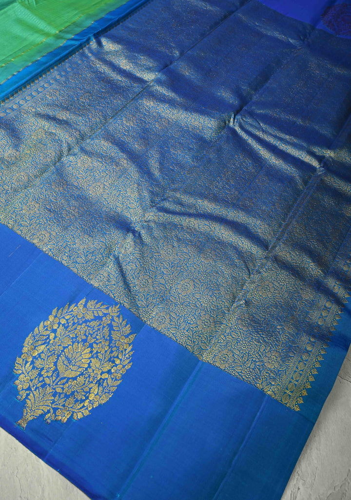 Sea Green Dual tone Pure Kanjivaram Silk Handloom Saree with Vairaoosi Zari Stripes and Distinct Floral Motifs on Contrast Border  | SILK MARK CERTIFIED